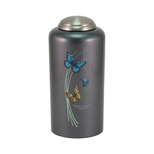 Dark gray-finish brass cremation urn with butterfly artwork front view on white background