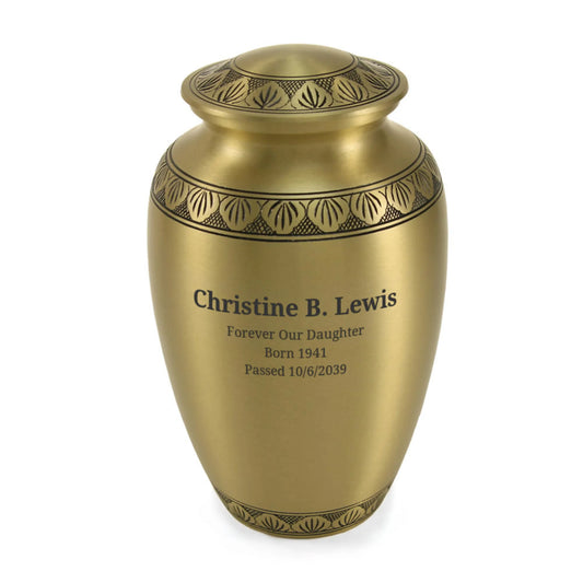 Bronze-finish brass cremation urn front view on white background, surface close-up