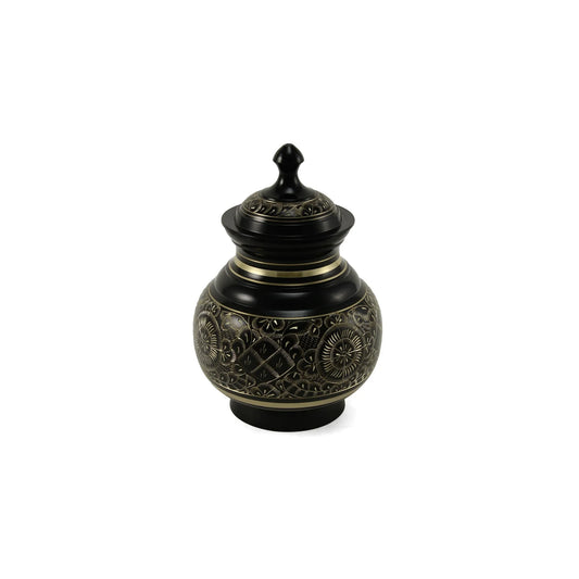 Dark metal decorative urn featuring intricate gold etched floral and circular patterns, accented with brass bands