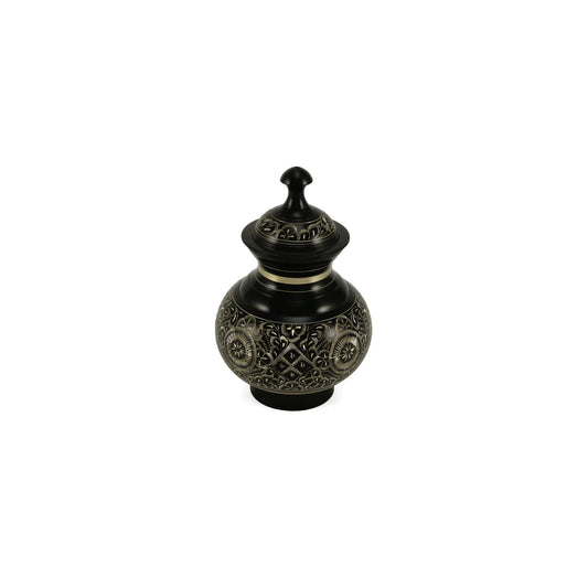 Inlaid metal pot featuring a lustrous black finish adorned with intricate silver floral and geometric patterns, a distinct