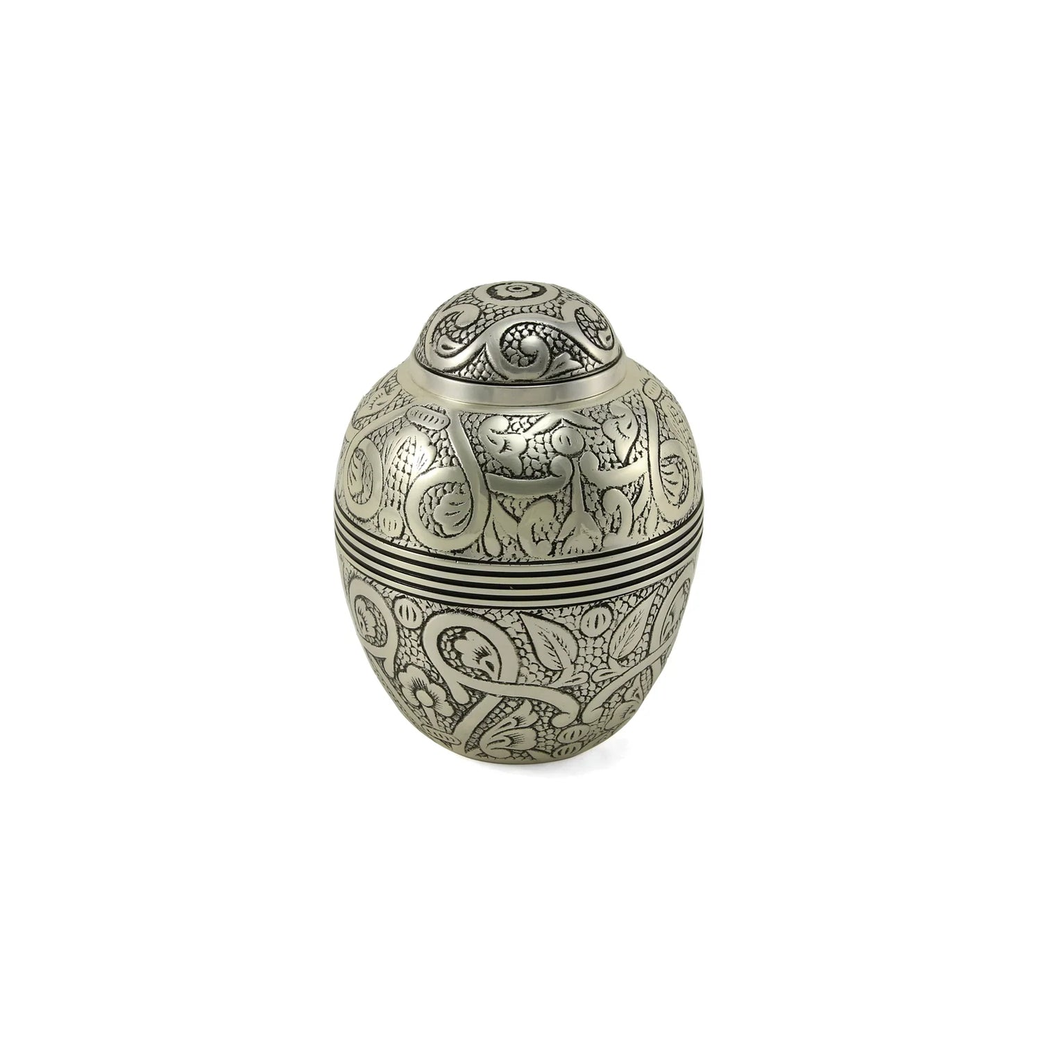 Silver metal lidded urn with intricate embossed floral and scrollwork patterns and a distinct black and silver striped band on a white background
