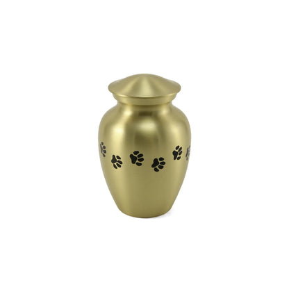 Metal pet cremation urn with a brushed gold finish featuring a decorative black paw print pattern and a matching domed lid