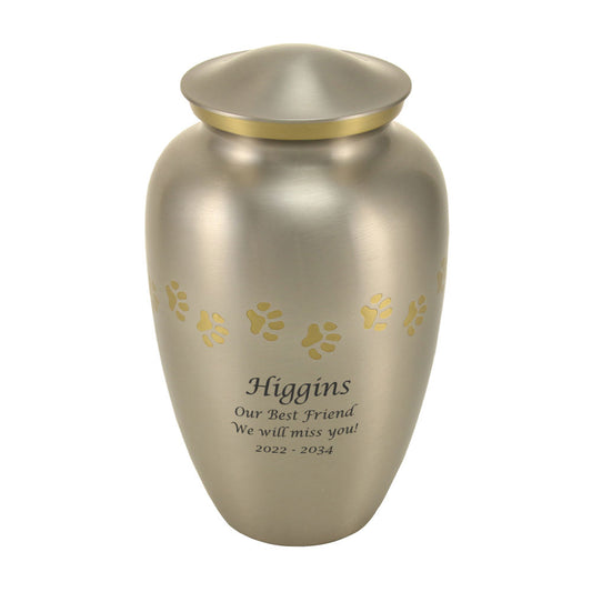 Pewter-finish brass cremation urn with paw print accents front view on white background