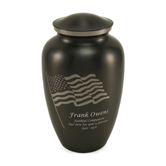 Slate-finish stainless steel cremation urn with American flag motif front view on white background