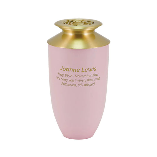 Rose blush-finish aluminum and brass tall cylindrical scattering urn with rose design upright on white background