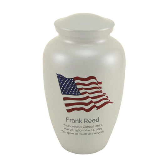 Stainless steel cremation urn with American flag design front view on white background