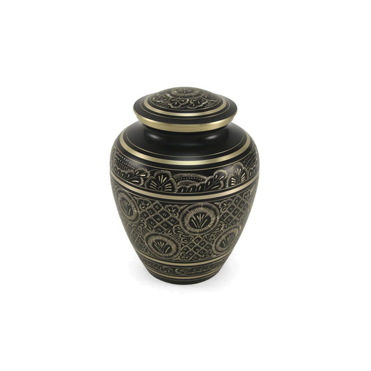 Brass cremation urn front view on white background, side detail