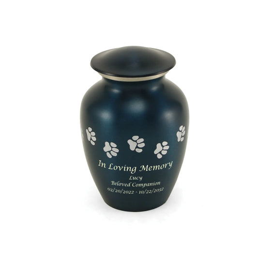 Blue-finish brass cremation urn with paw print accents front view on white background, full front view