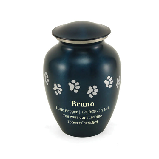 Blue-finish brass cremation urn with paw print accents front view on white background, straight front view