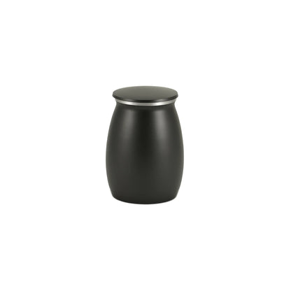 A sleek matte black modern container with a curved body featuring a flat lid and a polished silver ring detail