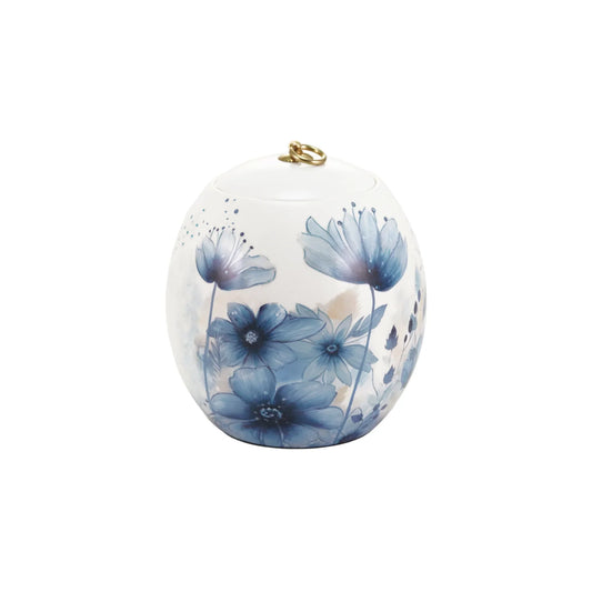 Ceramic cremation urn with floral design front view on white background