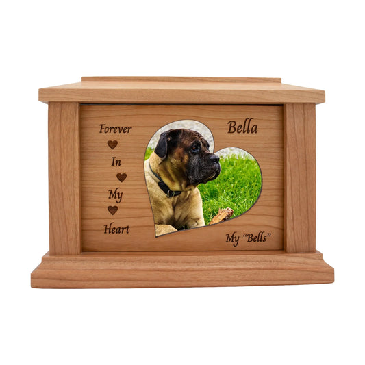 Cherry wood pet memorial box with heart accents around the photo opening and sample engraving