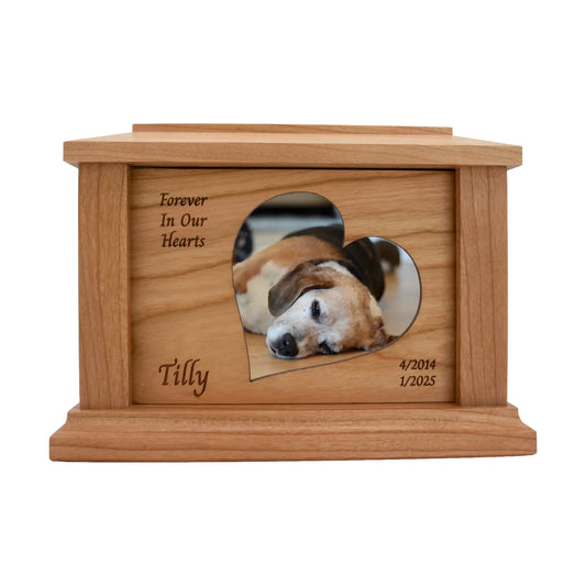 Cherry wood pet memorial box with corner engraving area and photo opening and sample engraving, straight front view