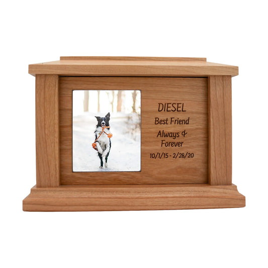 Cherry wood pet memorial box with rectangular photo opening and sample engraving, straight front view