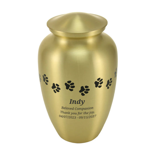 Bronze-finish brass cremation urn with paw print accents front view on white background