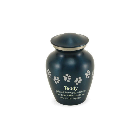 Blue-finish brass cremation urn with paw print accents front view on white background, lid detail