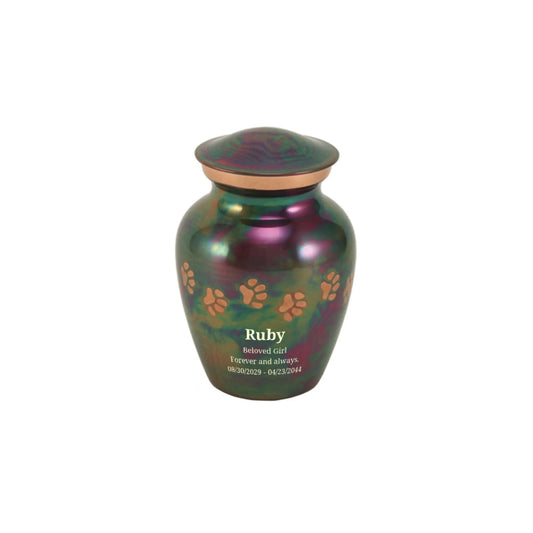 Pet urn with iridescent purple and blue swirling finish on white background in a centered front view
