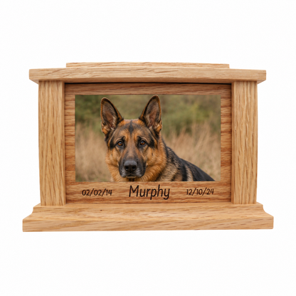 Wooden pet urn with a photo of a German Shepherd and engraved text on a white background